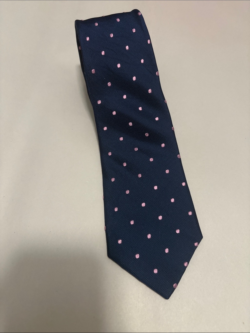 Men’s blue and pink polka dot silk tie